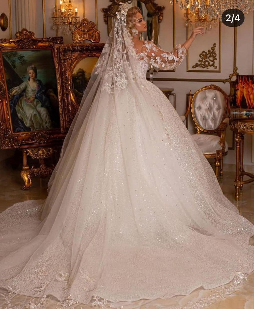 Vestido de novia largo de lujo con purpurina y mangas abullonadas