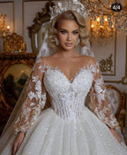 Vestido de novia largo de lujo con purpurina y mangas abullonadas