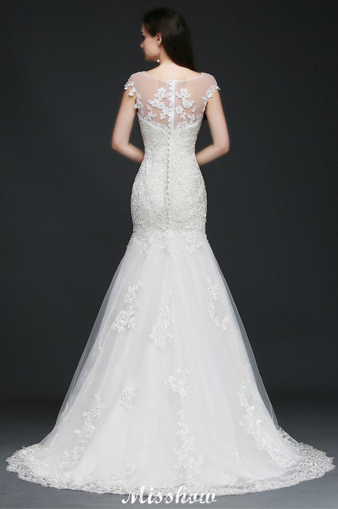 Vestido de novia de tul con encaje y joya de sirena
