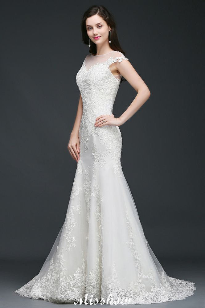 Vestido de novia de tul con encaje y joya de sirena