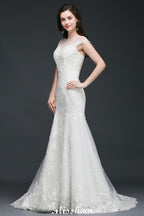 Vestido de novia de tul con encaje y joya de sirena