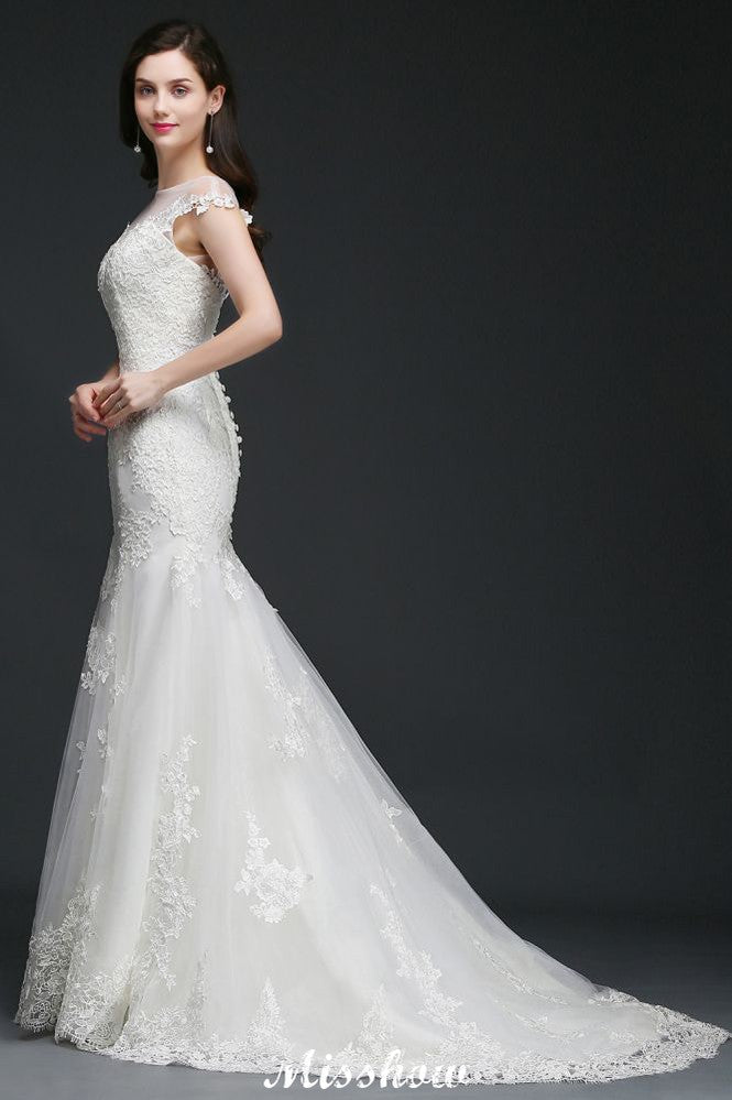 Vestido de novia de tul con encaje y joya de sirena