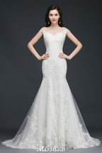 Vestido de novia de tul con encaje y joya de sirena
