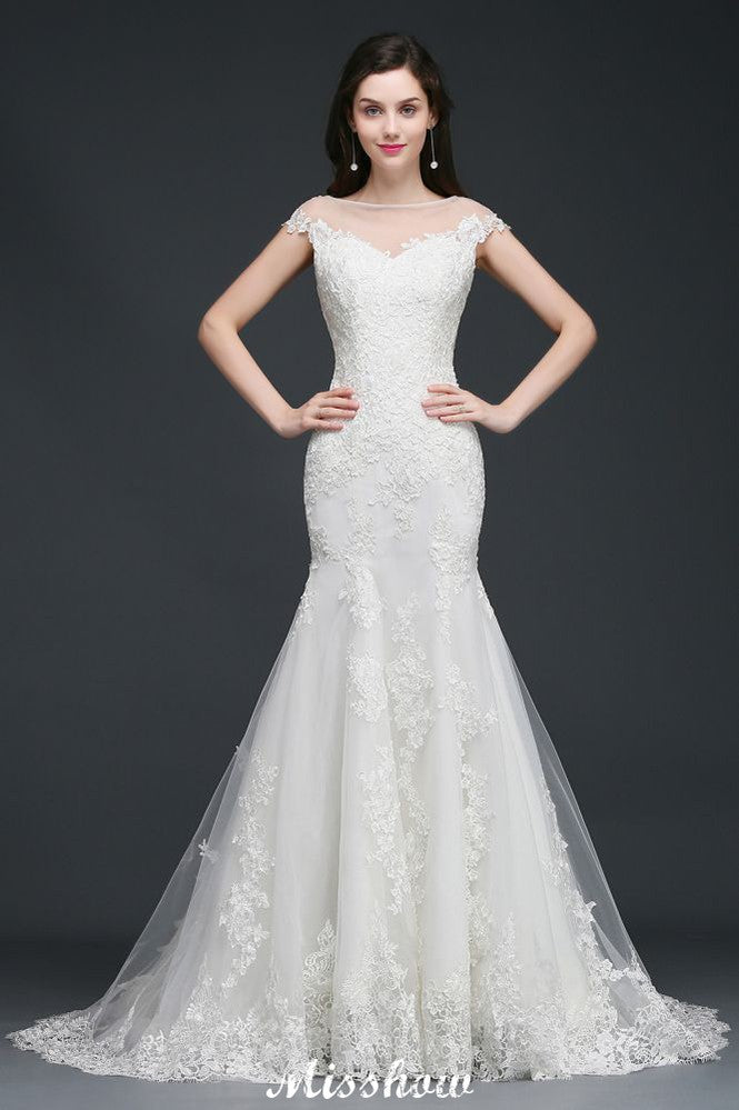 Vestido de novia de tul con encaje y joya de sirena