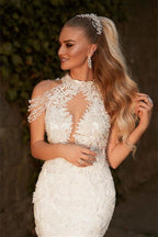 Vestido de novia de sirena con apliques y cuentas