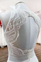 Vestido de novia modesto largo de gasa con apliques de joya y espalda abierta