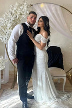 Vestido de novia largo hasta el suelo con lentejuelas y hombros descubiertos