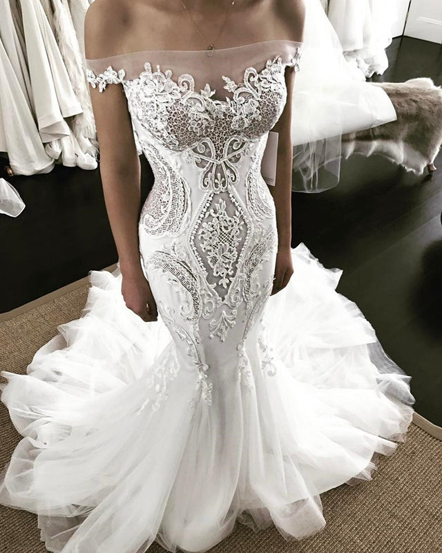 Vestido de novia de encaje sirena sin tirantes y hombros descubiertos