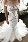 Vestido de novia de encaje sirena sin tirantes y hombros descubiertos