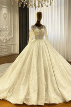 Vestido de novia elegante de princesa con corte en A, mangas largas y encaje con cola