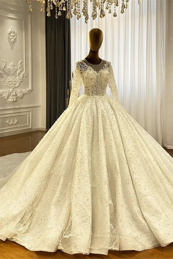 Vestido de novia elegante de princesa con corte en A, mangas largas y encaje con cola