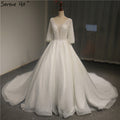 Weißes Brautkleid mit V-Ausschnitt und ausgestellten Ärmeln, Pailletten und Perlen, funkelndes High-End-Brautkleid