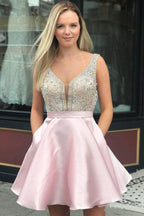Vestidos de fiesta cortos de satén con cuentas rojas y bolsillo PD290