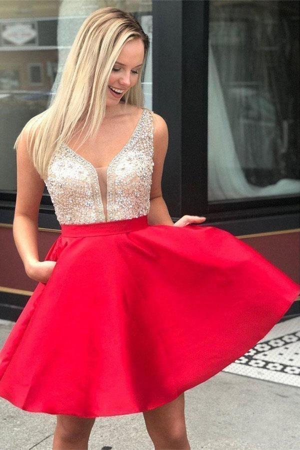 Vestidos de fiesta cortos de satén con cuentas rojas y bolsillo PD290