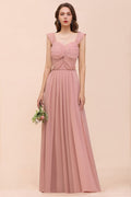 Vestido maxi rosa empolvado de dama de honor con tirantes y volantes en forma de A para niñas