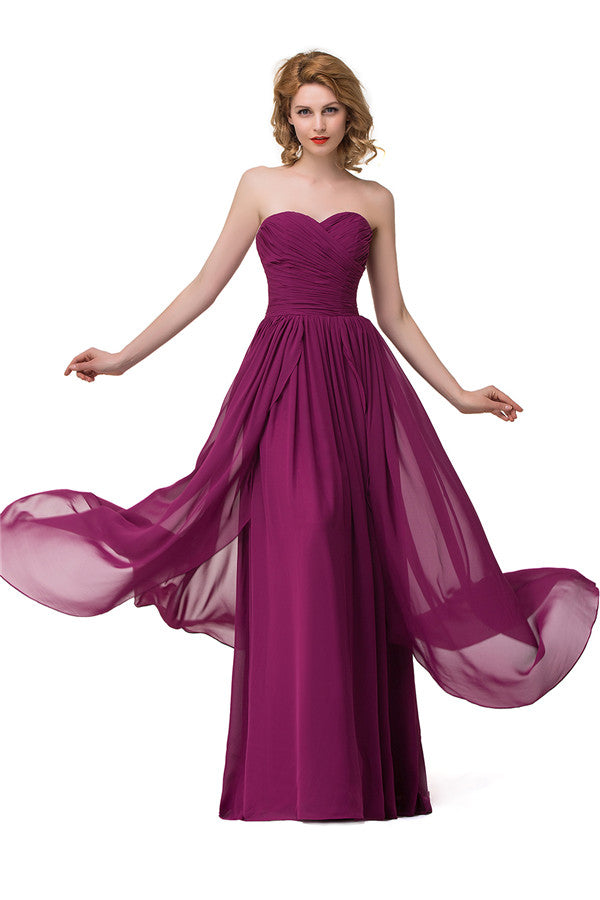 Vestidos de dama de honor sexys de gasa con escote en forma de A y volantes hasta el suelo