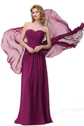 Vestidos de dama de honor sexys de gasa con escote en forma de A y volantes hasta el suelo