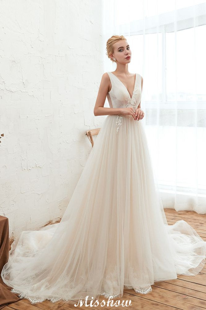 Vestido de novia sexy de tul estilo princesa con escote en V y apliques de encaje