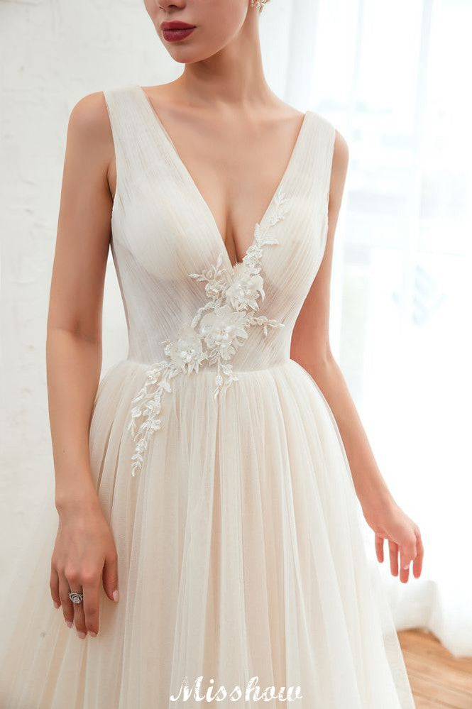 Vestido de novia sexy de tul estilo princesa con escote en V y apliques de encaje