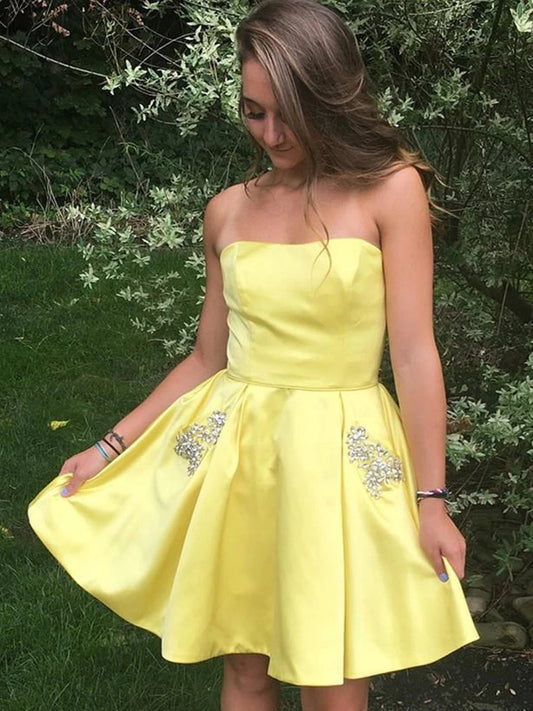 Kurzes gelbes A-Linien-Ballkleid aus Satin mit trägerlosem Rücken und Perlen