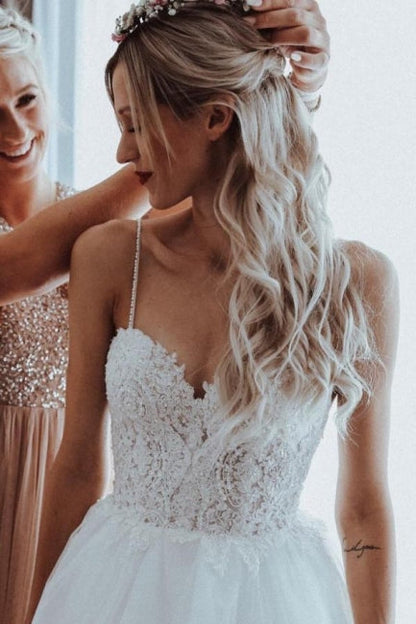 Vestidos de novia sencillos de corte A sin mangas con escote en forma de corazón y encaje