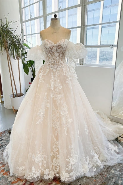 Vestido de novia de tul con encaje, sin mangas, largo hasta el suelo y apliques, sin tirantes y con escote en V