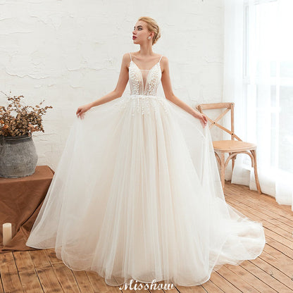 Spaghettiträger Tiefer V-Ausschnitt Brautkleid Tiefer Rücken Champagner Brautkleid