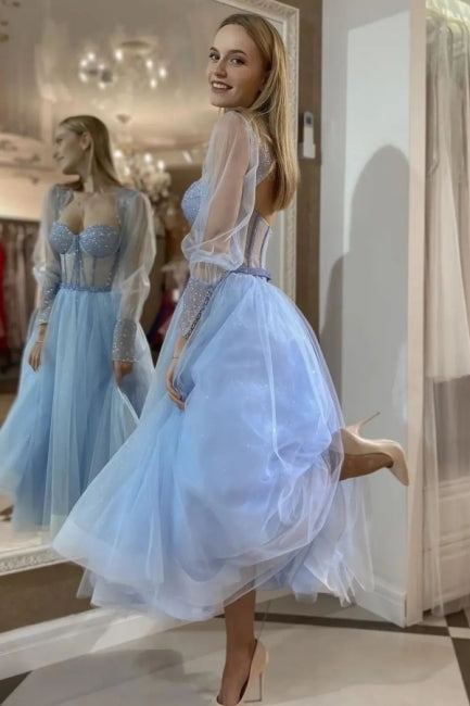 Impresionante vestido de fiesta largo azul de tul con escote en forma de A y mangas largas con purpurina