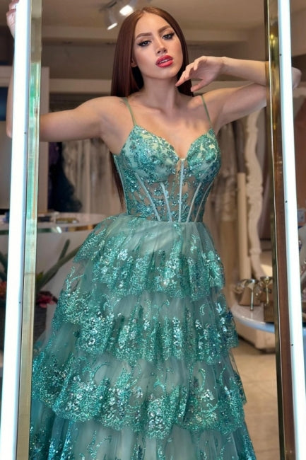 Stilvolles langes grünes A-Linien-Ballkleid mit Spaghettiträgern und Pailletten