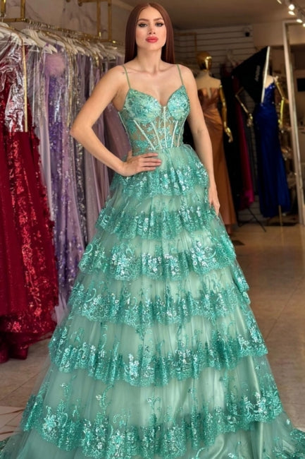Stilvolles langes grünes A-Linien-Ballkleid mit Spaghettiträgern und Pailletten