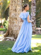 Vestido de gasa con escote en V y parte superior asimétrica hasta el suelo