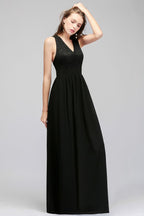 Vestido de dama de honor negro con escote en V, largo hasta el suelo, sin mangas y parte superior de encaje
