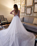 Vestido de novia vintage de tul con escote en V y espalda abierta