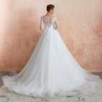 Wunderschönes langes A-Linien-Brautkleid aus Tüll mit Applikationen und Ärmeln