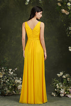 Vestido de dama de honor amarillo de corte barco, de gasa, con volantes, abertura hasta el suelo y bolsillos